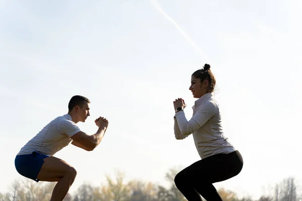 Two Amazing Attractive Fit Friends Doing Squad Exercise Smiling Close — ストック写真