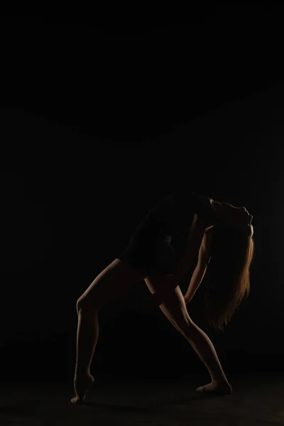 Silhouette Ballerina Bending Her Back One Foot Front Other — Stock Fotó
