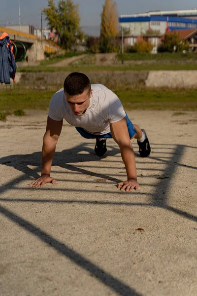 Attractive Handsome Fit Guy Doing Some Push Ups Ground — Stockfoto
