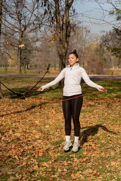 Attractive Beautiful Fit Girl Jumping Rope While Being Focused — Stock Photo, Image