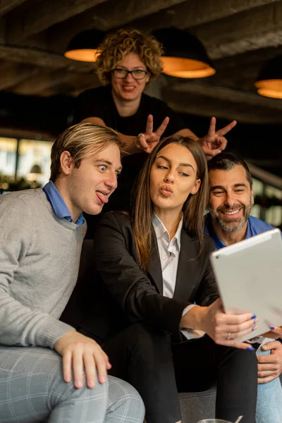 Four Amazing Business People Taking Selfie Together Tablet —  Fotos de Stock