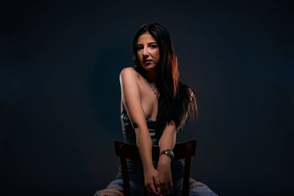 Attractive Beautiful Girl Sitting Chair While Posing Studio Dark Background — Stockfoto