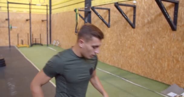 Handsome Fit Guy Doing Some Stretches While Warming Training — Vídeo de Stock