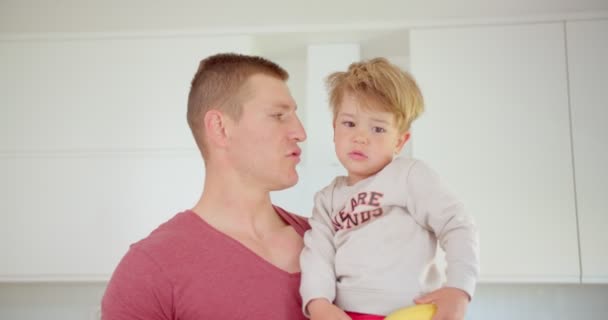 Handsome Father Telling His Son Back Bed — Vídeo de Stock