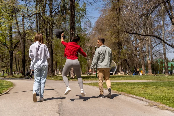 Cheerful Young Friends Walking Park Spending Time Together Having Fun — Stock Photo, Image