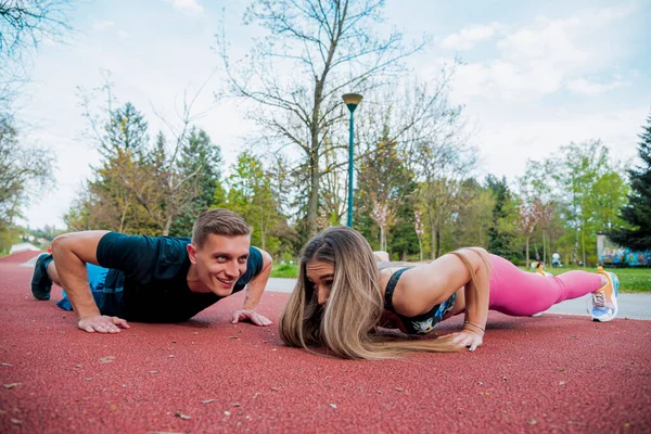 Fit Man Beautiful Woman Practicing Running Exercise Outdoor Grass Stretching — Stock fotografie