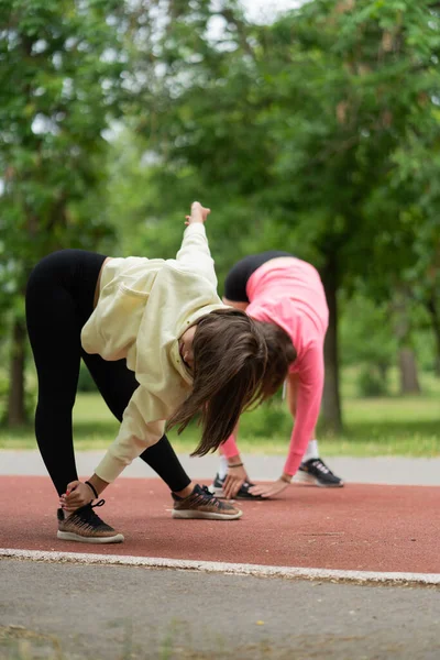 Two Attractive Beautiful Young Girls Stretching — Stock Photo, Image