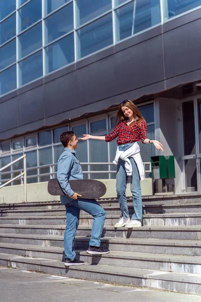 Cute Couple Talking While Standing Stairs Front Building — Foto Stock