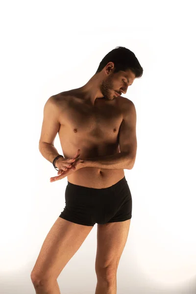 Attractive Sexy Man Studio Making Seductive Poses Touching Himself — 图库照片