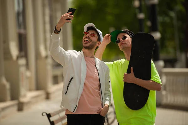 Two Male Friends Taking Crazy Selfies Together — Stockfoto