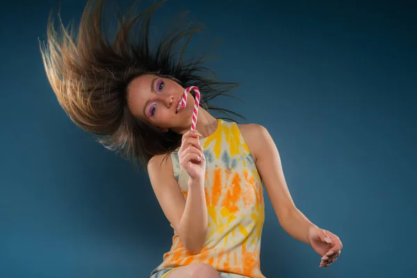 Amazing Attractive Young Girl Flipping Her Hair Studio Blue Backgrpound — 图库照片