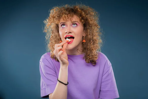 Sweet Girl Putting Bubble Gum Her Mouth While Being Happy — Stockfoto