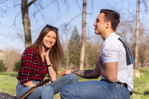 Cute Girl Laughing Her Boyfriend While Sitting Park — Stock Fotó