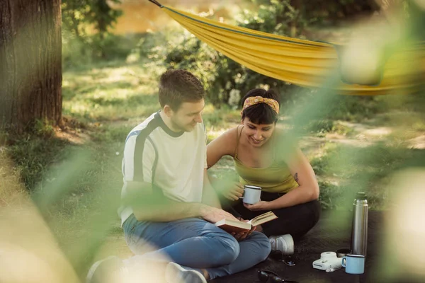 Pretty Couple Reading Book Together While Sitting Picnic Park — Fotografia de Stock