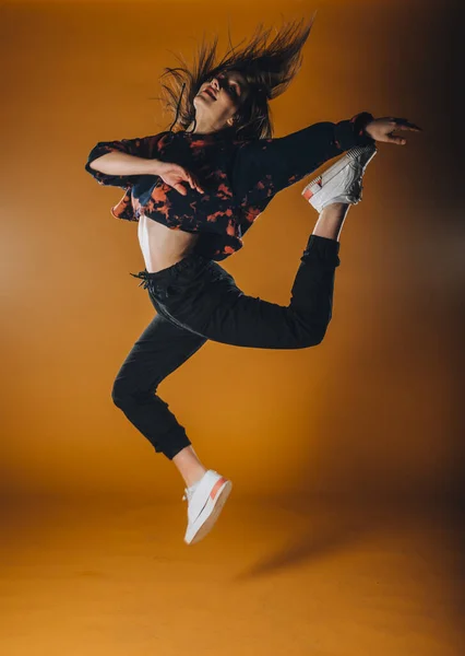 Female dance dancer exercising poses during a dance practice