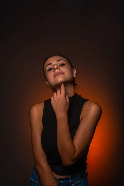 Attractive Beautiful Young Girl Studio Posiing While Touching Her Neck — Foto Stock
