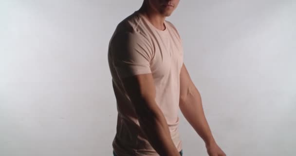 Handsome Man Adjusting Shirt Studio Isolated — Video