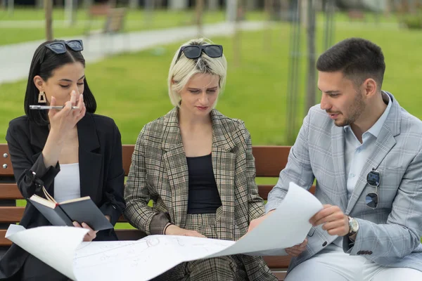 Three Business People Talking Planogram Company — Photo