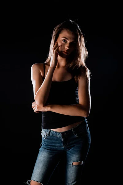 Attractive Young Female Model Posing Black Tank Top Denim Pants — 图库照片