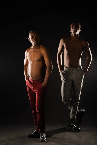 Two Black Males Doing Two Similar Poses Studio While Having — Foto Stock