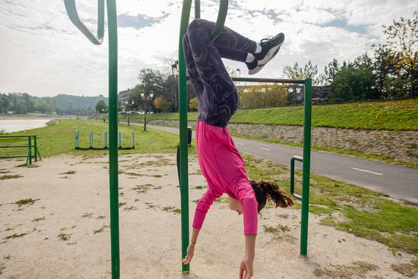 Attractive Beautiful Fit Girl Hanging Training Bars — Stock Photo, Image