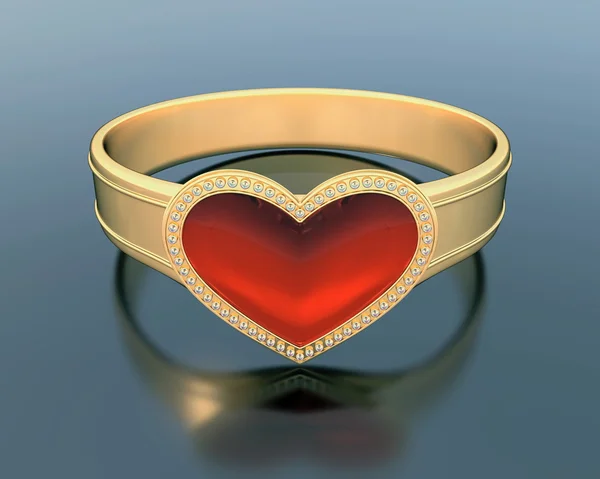 Gold ring with a heart shape ruby — Stock Photo, Image