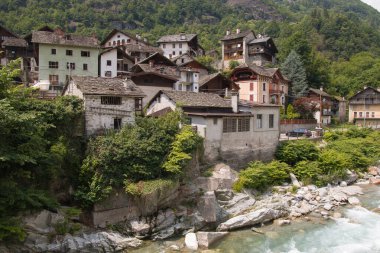 View of village of Campertogno, during summer season, in Valsesia (Sesia Valley). Province of Vercelli, Piedmont, Italy clipart