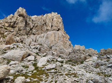View of the rocky peaks of Monte Corvo against the blue sky in Abruzzo Italy