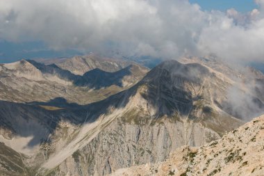 Wild and rocky mountains view from the summit of Gran Sasso d'Italia massif in Abruzzo