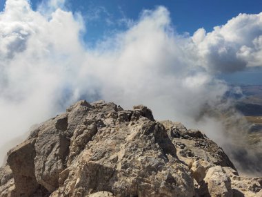 Panoramic view of the peak of Corno Grande with cloud in the summer season Abruzzo Italy