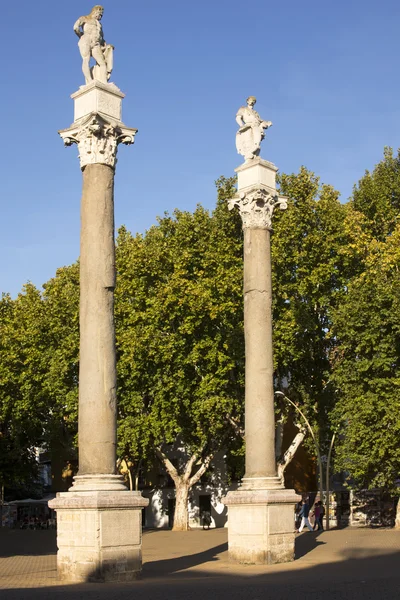 Hercule standbeelden in Sevilla Stockfoto