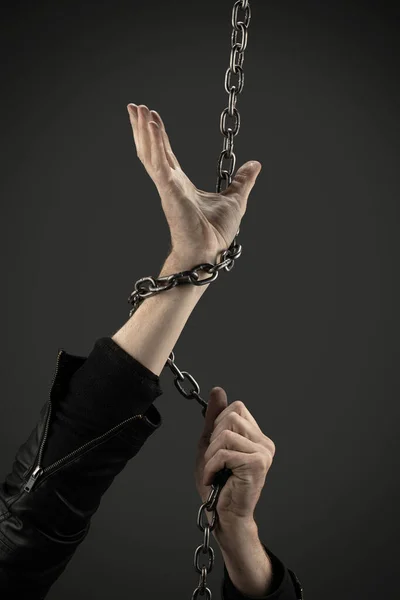 Hands Entwined Iron Chains Dark Background Concept — Stock Photo, Image