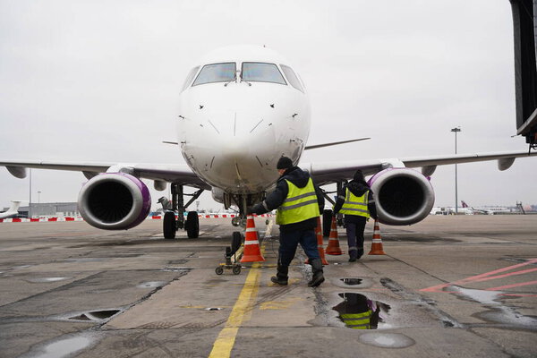Almaty, Kazakhstan - 03.16.2022 : The plane of the Mongolian airline Hunnu Air is parked at the airport site.