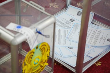 Almaty, Kazakhstan - 06.05.2022 : Citizens vote in a referendum at their polling station.