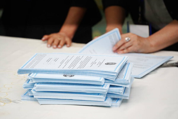 Almaty, Kazakhstan - 06.05.2022 : Counting of votes after the closing of the polling station. 