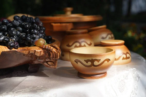 Wooden carved tableware with Kazakh national pattern