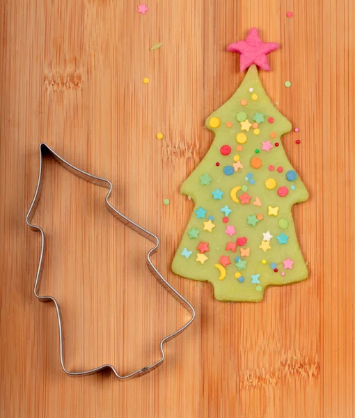 Christmas tree and metal cutter — Stock Photo, Image