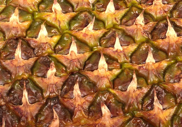 Närbild ytan av färsk mogen ananas — Stockfoto