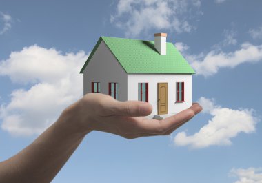 la casa en una casa de mano