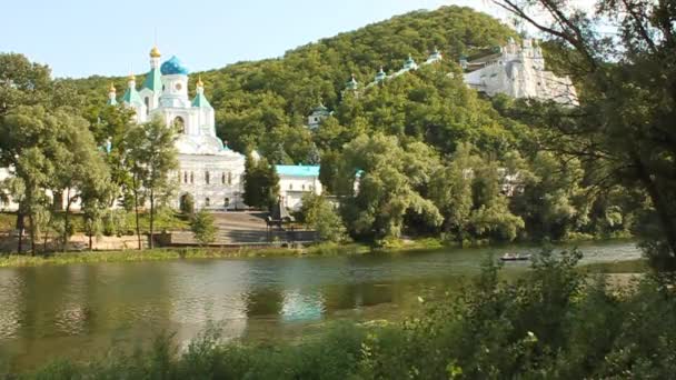 Holy Assumption Monastery and boat — Stock Video