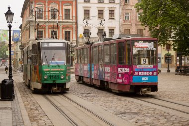Trams in the streets of the old city clipart