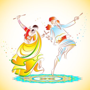 dandiya oynayan Çift