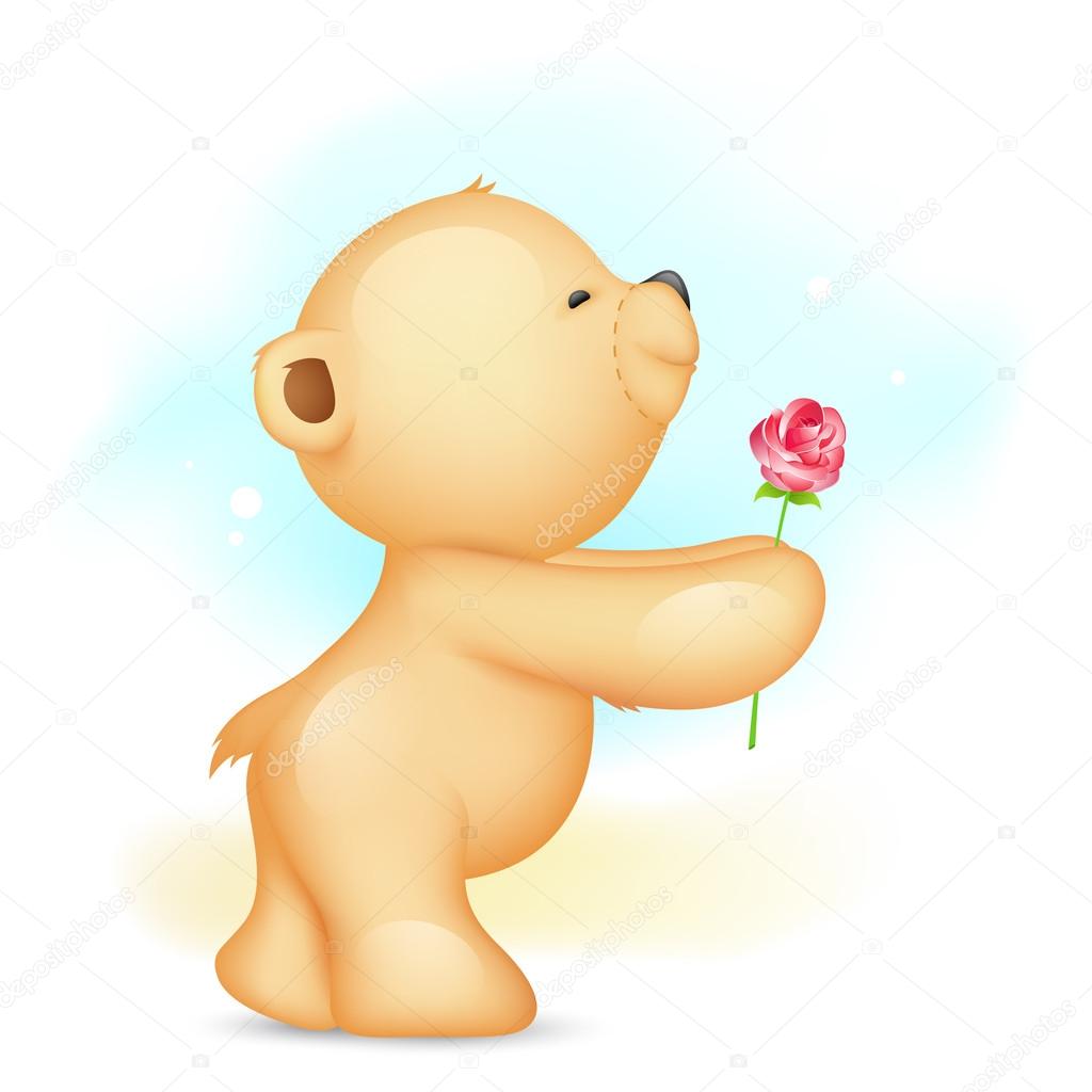 teddy bear holding a rose