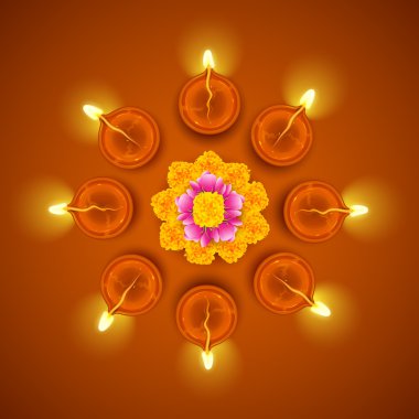 Diwali diya çiçek rangoli üzerine dekore edilmiştir