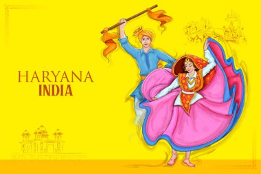 Couple performing Phag dance traditional folk dance of Haryana, India