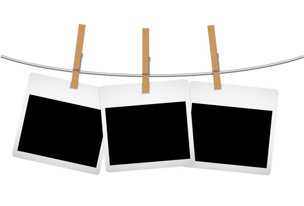 Фотография висит на шнурке
