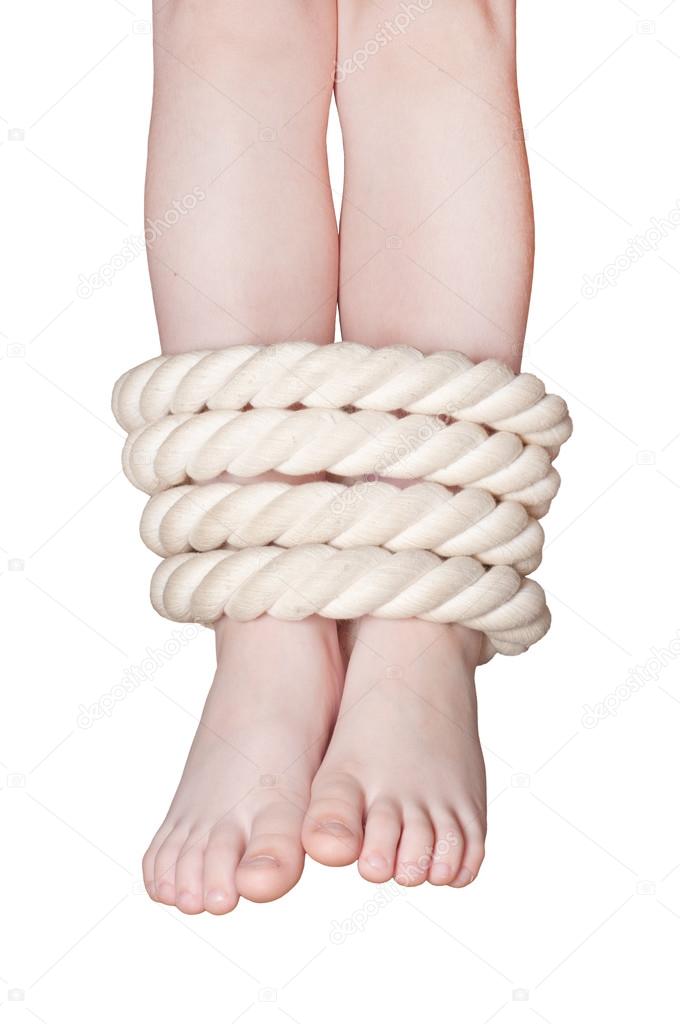 Female legs with rope