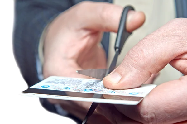 Hombre con tijera y tarjeta de crédito —  Fotos de Stock