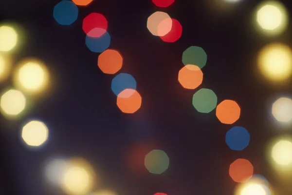 Holiday Christmas Glowing Color Lights Sparkles Blurred Bright Christmas Abstract — Stock Photo, Image