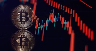 Kripto para birimi bitcoin altın sikke ve çözülmüş grafik arkaplan.